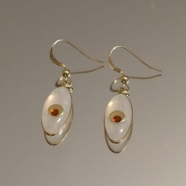 Boucle d’oreilles Ovales serti d’un Grenat - Transparente